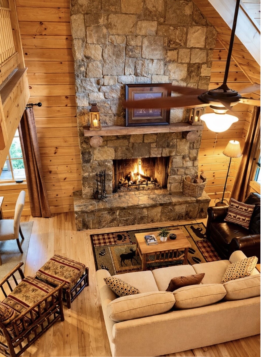 Window view of the wooded mountainside from the dining table