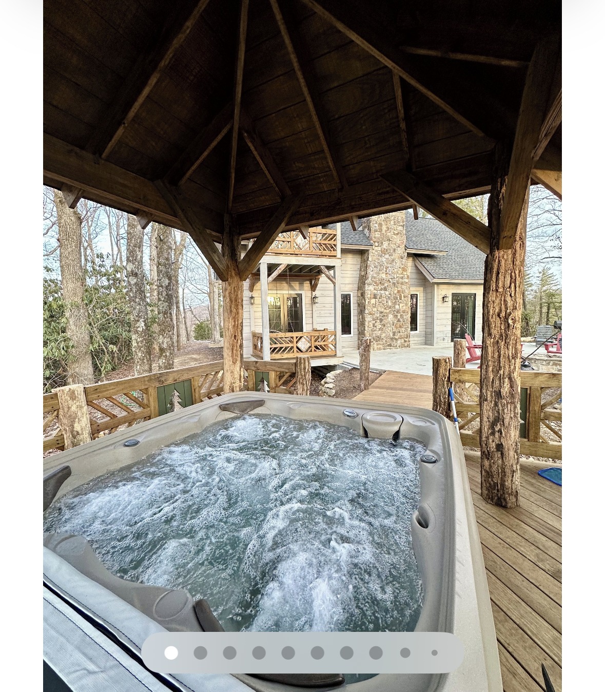 Private hot tub under a covered timber gazebo