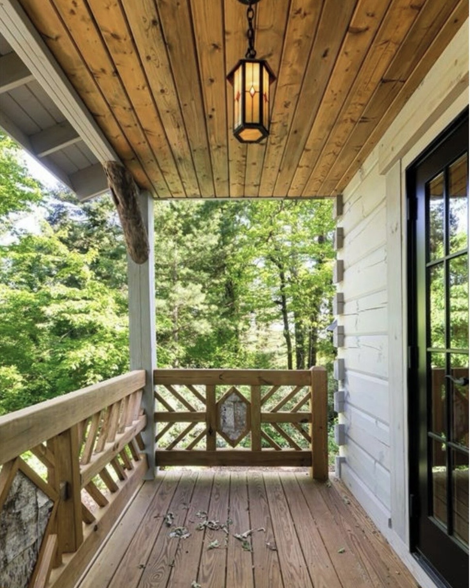 Covered side porch with pendant light